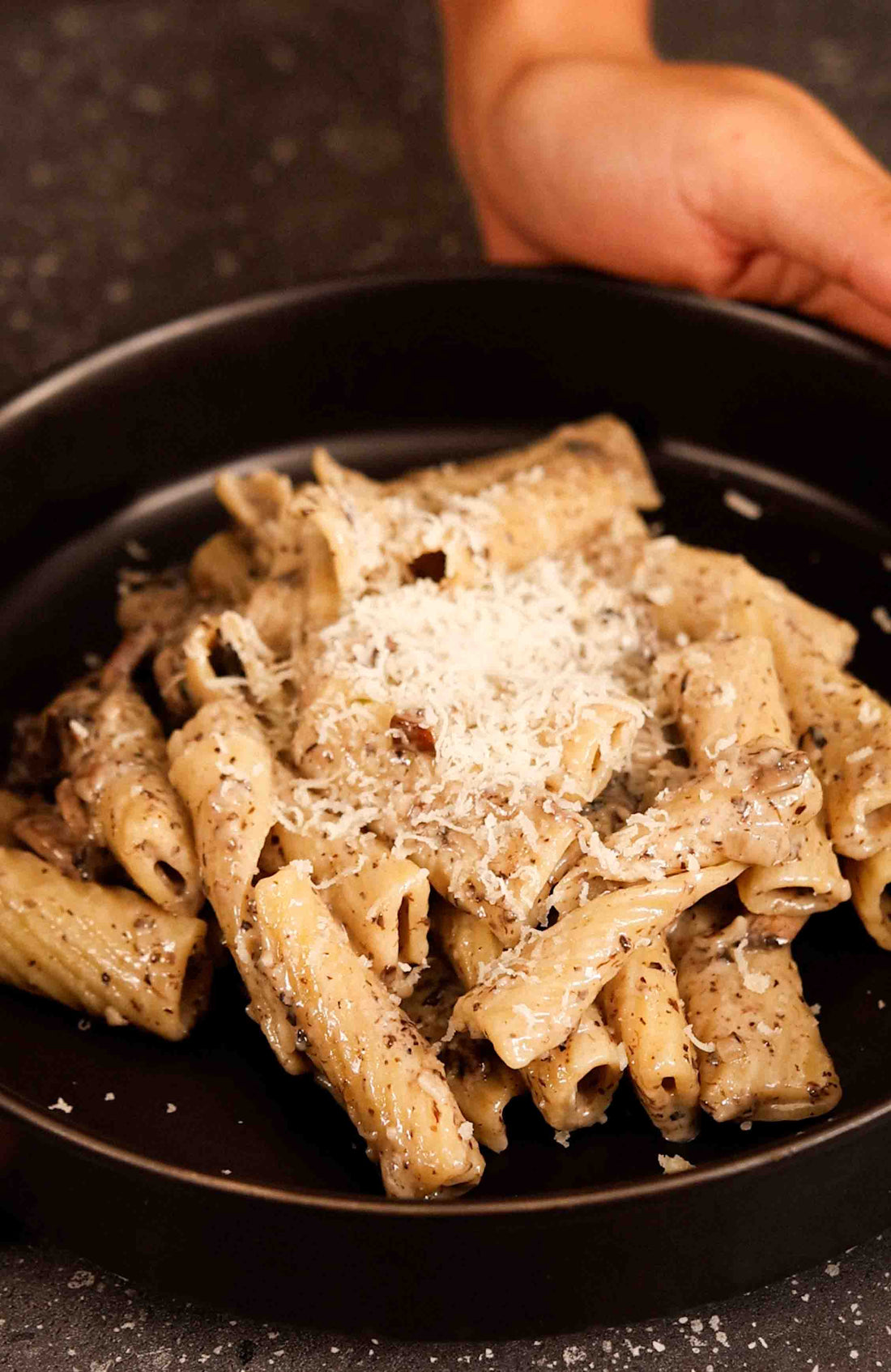 A plate of delicious Pasta Al Tartufo Nero made by the Round Claypot Multi-Cooker.