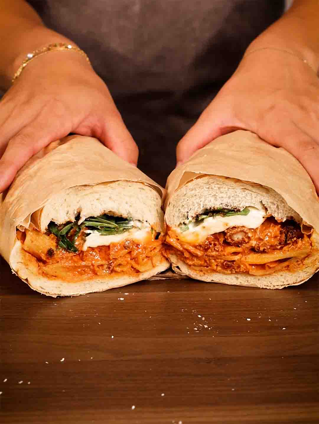 A sliced Spicy Vodka Pasta Chicken Sandwich made with the Combo Air Fryer. 