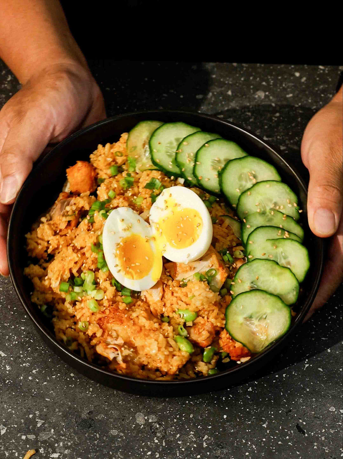 A bowl of Gochujang Chicken Rice made in the Claypot Rice Cooker. 