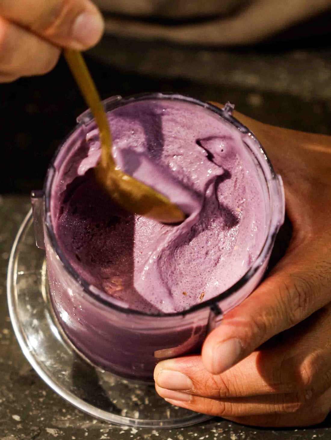 A cup of delicious Ube Malted Crunch Protein Ice Cream made using the Magnifique Handheld Ice Cream Maker