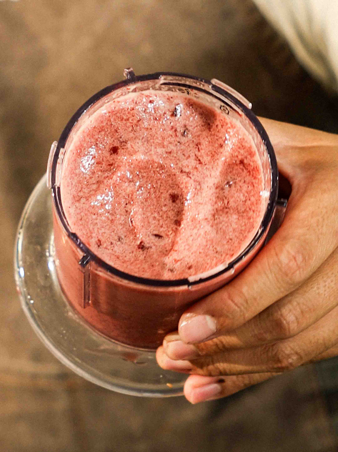 A cup of delicious Tart Cherry Sorbet in a cup made using the Magnifique Handheld Ice Cream Maker