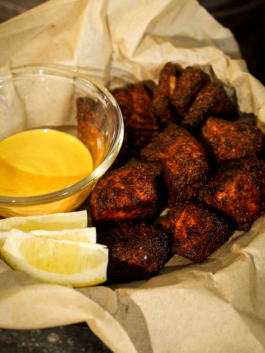 A plate of Crispy Salmon Bites prepared using the Magnifique Glass Air Fryer