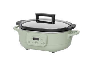 The Slow Cooker in a stylish design with a digital display and glass lid for perfect cooking.
