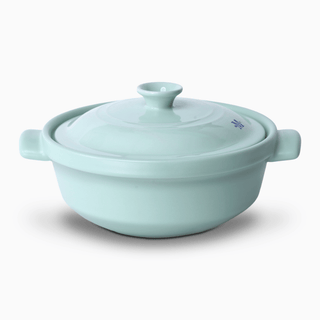 The Flami Pot, a non-toxic clay pot cookware, perfect for baking and cooking delicious meals.