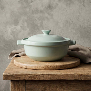 The Flami Pot handcrafted clay pot perfect for cookware and bakeware, made from non-toxic materials.