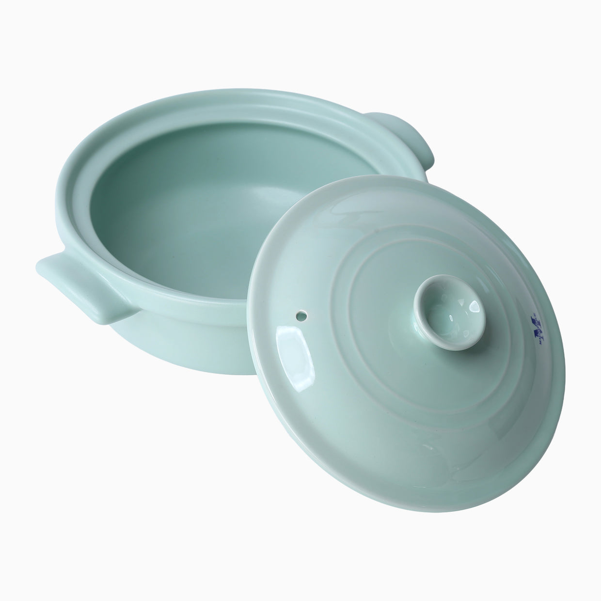 The Flami Pot, a handcrafted, PFAS-free cookware made from non-toxic clay, perfect for healthy, chemical-free cooking.