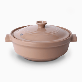 The Flami Pot, a handcrafted non-toxic clay pot ideal for cookware and bakeware.