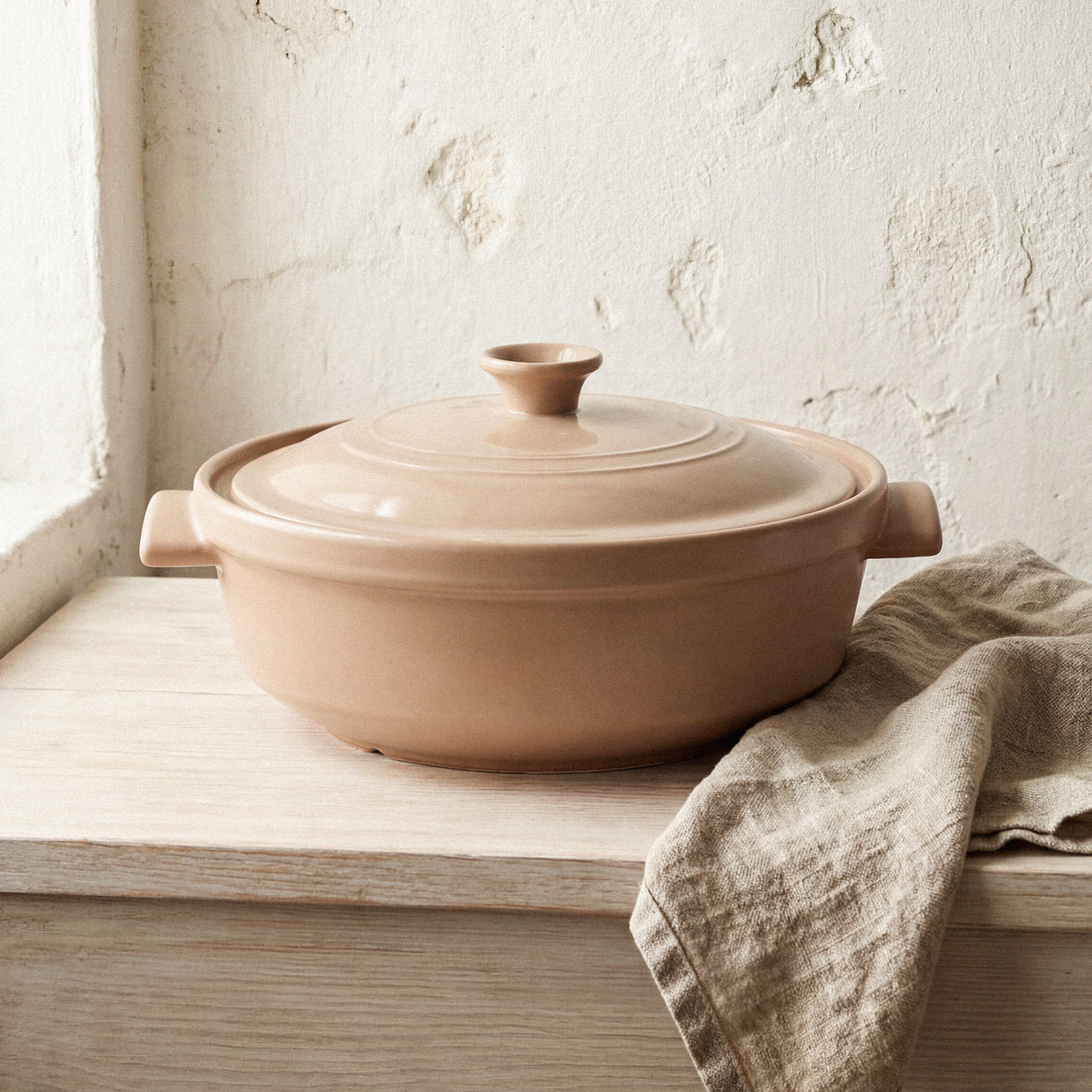 The Flami Pot, a handcrafted non-toxic clay cookware for healthy and chemical-free cooking.