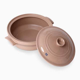 The Flami Pot: Handcrafted clay cookware with a lid, perfect for non-toxic baking and cooking.