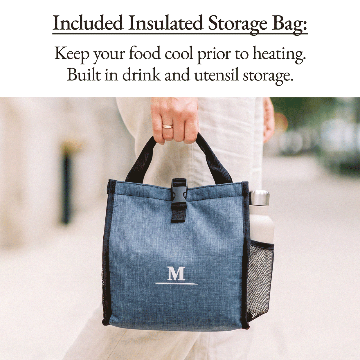 Person carrying the included navy insulated storage bag with built-in drink and utensil storage