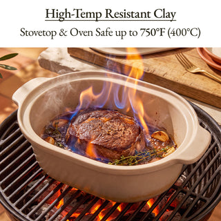 Casserole Claypot Multi-Cooker with high-temp resistant clay, stovetop and oven safe up to 750°F, cooking steak.