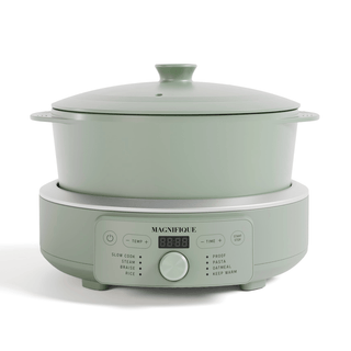 Round Claypot Multi-Cooker in soft green, a non-toxic multi-cooker for sautéing, steaming, and cooking.