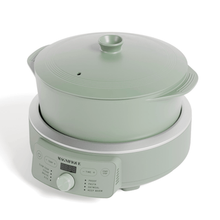 Round Claypot Multi-Cooker in mint green design, ideal for non-toxic cooking and meal preparation.
