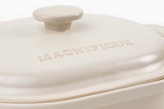 The Claypot: Pot & Lid Set - close-up of the lid featuring the word MAGNIFIQUE, showcasing its elegant design.