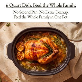 The Slow Cooker with 6-quart capacity cooking a whole chicken with herbs and lemons.